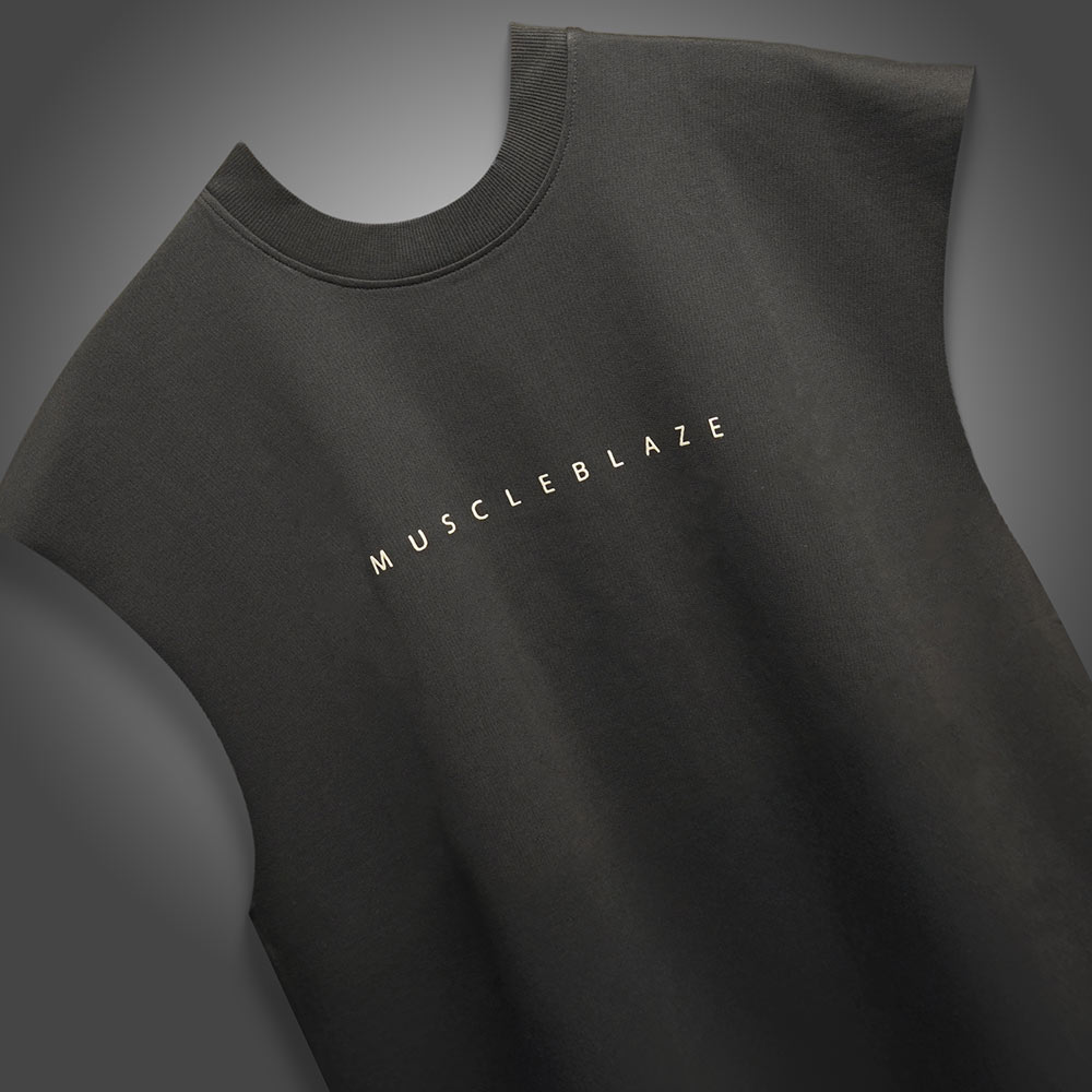 https://img6.hkrtcdn.com/40807/prd_4080625-MuscleBlaze-B.D.S.M-Oversized-Tank-Medium-Charcoal_o.jpg