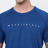 https://img6.hkrtcdn.com/43457/prd_4345665-MuscleBlaze-Active-Tee-Half-Sleeve-Medium-Teal-Blue_o.jpg