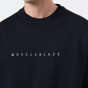 8 - MuscleBlaze Carnage Oversized Tshirt,  Medium  Black 